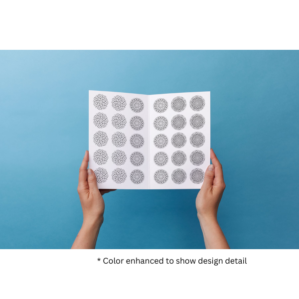 [Design: Modern Dots] Hands holding a sheet of modern dots decals