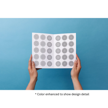 [Design: Modern Dots] Hands holding a sheet of modern dots decals