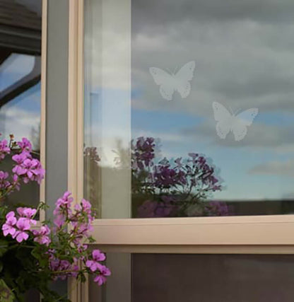 Butterfly Window Decal  in UseButterfly Window Decal what we see and what birds see.Aspen Leaf UV decals to prevent bird strikes. 